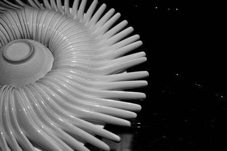 Abstract background of sparkling white spoon on reflection surface. selective focus shotの写真素材