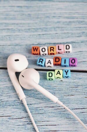 colorful World Radio Day word cube on wooden backgroundの写真素材