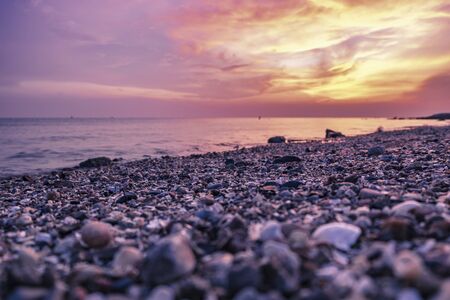 Travel and leisure concept, beautiful sea view scenery over stunning sunrise background.sunlight beam and soft wave hitting sandy beachの写真素材