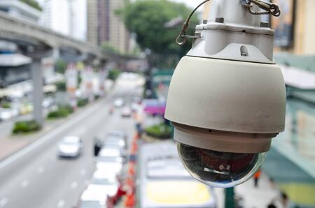 Security equipment concept, cctv or surveillance camera operated to monitor traffic status in modern cityの写真素材