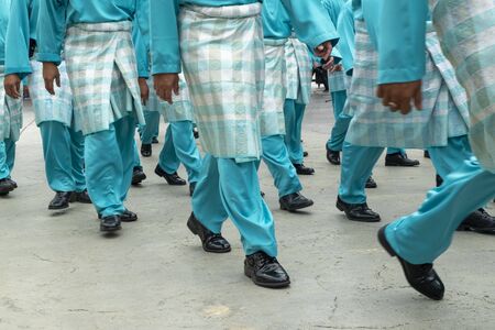 Malay Man in traditional attire called BAJU MELAYU during Maulidur Rasul ceremony