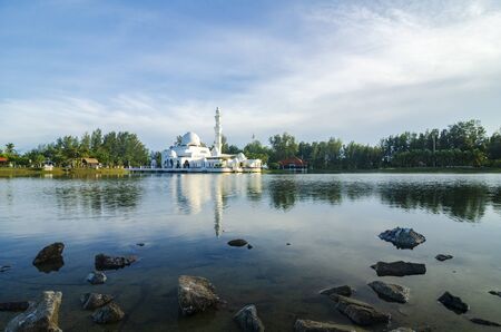 beautiful nature and reflection of Tengku Tengah Zaharah Mosque, most iconic floating mosque located at Terengganu Malaysia.の写真素材