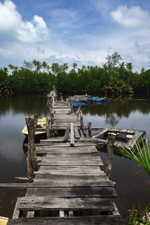 Traditional fishing village scenery located in Terengganu, Malaysia under blue sky backgroundの写真素材