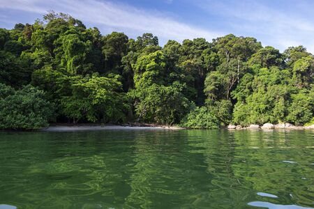 beauty in nature, Monkey Bay Beach located in Pangkor Island, Perak State, Malaysia under bright sunny day and blue sky backgroundの写真素材