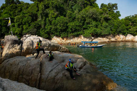 PANGKOR ISLAND, MALAYSIA - MARCH 15, 2020: main attractive activities at Nipah Bay is island hopping and discover beautiful nature of Coral Islandのeditorial素材