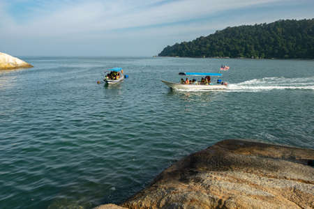 PANGKOR ISLAND, MALAYSIA - MARCH 15, 2020: main attractive activities at Nipah Bay is island hopping and discover beautiful nature of Coral Islandのeditorial素材