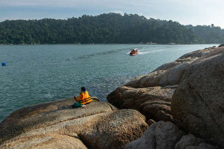 PANGKOR ISLAND, MALAYSIA - MARCH 15, 2020: main attractive activities at Nipah Bay is island hopping and discover beautiful nature of Coral Islandのeditorial素材
