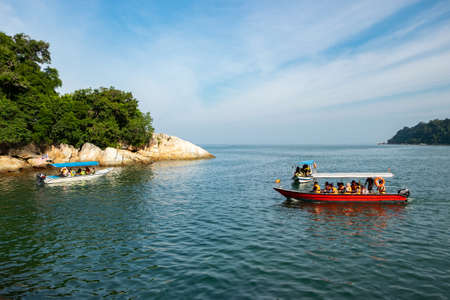 PANGKOR ISLAND, MALAYSIA - MARCH 15, 2020: main attractive activities at Nipah Bay is island hopping and discover beautiful nature of Coral Islandのeditorial素材