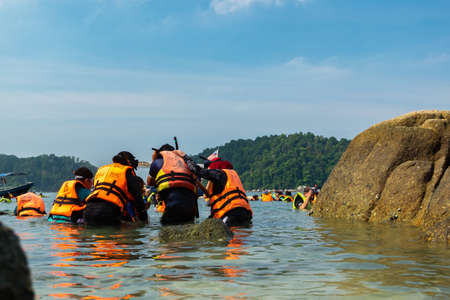 PANGKOR ISLAND, MALAYSIA - MARCH 15, 2020: main attractive activities at Nipah Bay is island hopping and discover beautiful nature of Coral Islandのeditorial素材