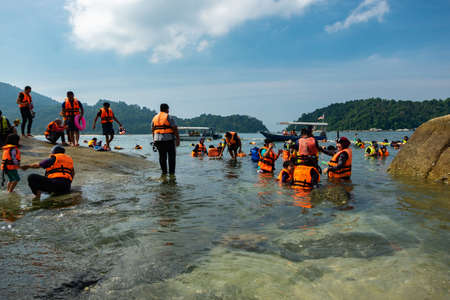 PANGKOR ISLAND, MALAYSIA - MARCH 15, 2020: main attractive activities at Nipah Bay is island hopping and discover beautiful nature of Coral Islandのeditorial素材