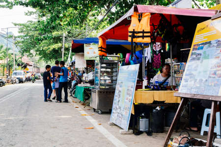 PANGKOR ISLAND, MALAYSIA - MARCH 15, 2020:The edge shopping stalls located on the sidewalk of Nipah Bay Pangkor Islandのeditorial素材
