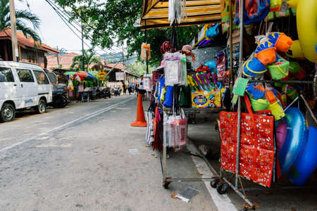 PANGKOR ISLAND, MALAYSIA - MARCH 15, 2020:The edge shopping stalls located on the sidewalk of Nipah Bay Pangkor Islandのeditorial素材