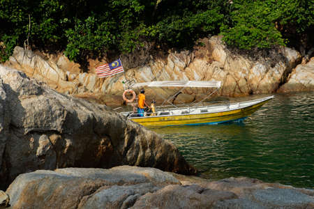 PANGKOR ISLAND, MALAYSIA - MARCH 15, 2020: main attractive activities at Nipah Bay is island hopping and discover beautiful nature of Coral Islandのeditorial素材
