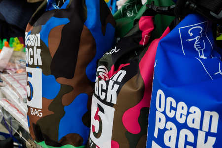 PANGKOR ISLAND, MALAYSIA - MARCH 15, 2020: variety of dry bag can be found at street stall around Nipah Bay for beach activities usageのeditorial素材