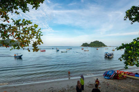 PANGKOR ISLAND, MALAYSIA - MARCH 15, 2020: Boat for island hopping and water sport activities at Nipah Bayのeditorial素材