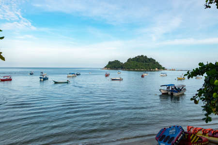 PANGKOR ISLAND, MALAYSIA - MARCH 15, 2020: Boat for island hopping and water sport activities at Nipah Bayのeditorial素材