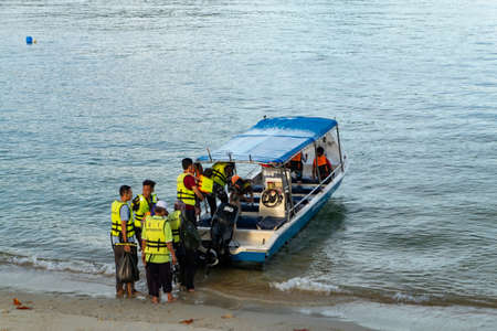PANGKOR ISLAND, MALAYSIA - MARCH 15, 2020: Boat for island hopping and water sport activities at Nipah Bayのeditorial素材