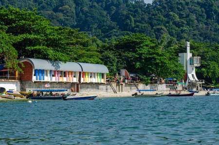 PANGKOR ISLAND, MALAYSIA - MARCH 15, 2020: Boat for island hopping and water sport activities at Nipah Bayのeditorial素材