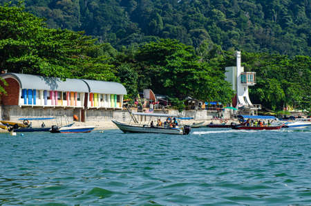 PANGKOR ISLAND, MALAYSIA - MARCH 15, 2020: Boat for island hopping and water sport activities at Nipah Bayのeditorial素材