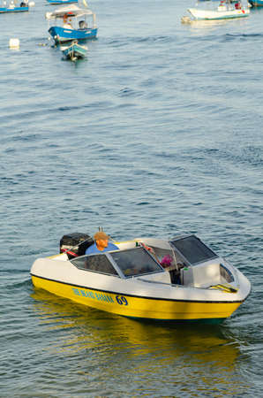 PANGKOR ISLAND, MALAYSIA - MARCH 15, 2020: Boat for island hopping and water sport activities at Nipah Bayのeditorial素材