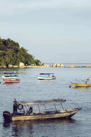 PANGKOR ISLAND, MALAYSIA - MARCH 15, 2020: Boat for island hopping and water sport activities at Nipah Bayのeditorial素材