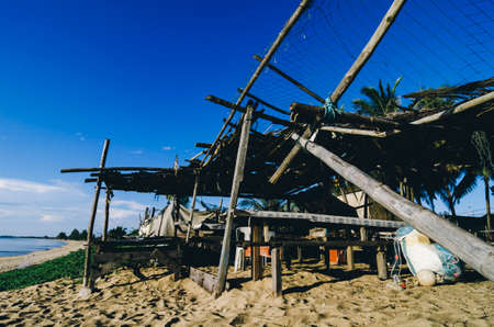 Peaceful scenery near the seashore with bamboo hut ,against blue sky background in Terengganu, Malaysia.の写真素材
