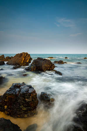amazing nature landscape at kemasik beach Terengganu, Malaysia against blue sky backgroundの写真素材