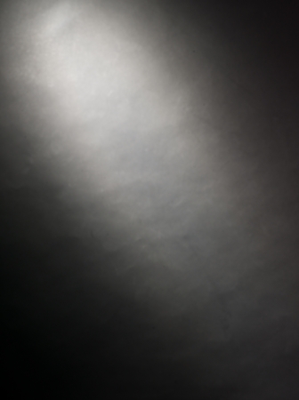 Single light source from top left on black backgroundの写真素材