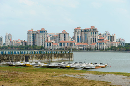 Singapore, Feb 25, 2014 - Dragonboats along the river bank of Kallang river with high-rise buildings in the background taken in the day on Feb 25, 2014のeditorial素材