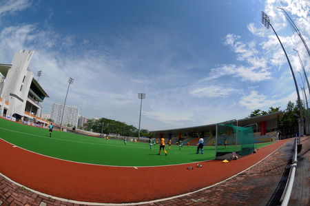 Singapore, Jun 25, 2014 - Fisheye view of sky over hockey pitch at Sengkang Sports and Recreational Center taken in the day on Jun 25, 2014のeditorial素材