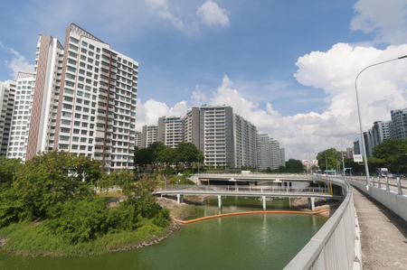 Singapore - May 18, 2016: Public Housing along river bankのeditorial素材