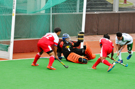 Singapore, Singapore - June 27, 2018 - Action during an international Hockey Open Series field match between Taipei and Indonesia held in Singaporeのeditorial素材
