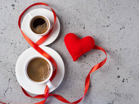 Two cups of coffee in the form of 8 international women's day conceptの写真素材
