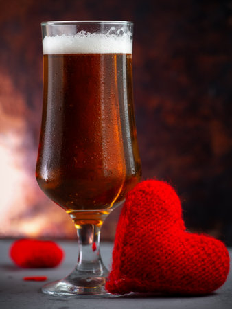 A glass of beer for Valentine's day. Gift to a manの写真素材