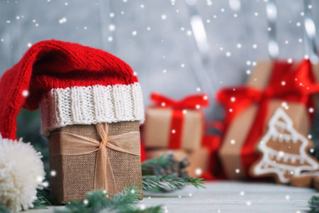 Festive Christmas and new year gifts in Santa hatの写真素材