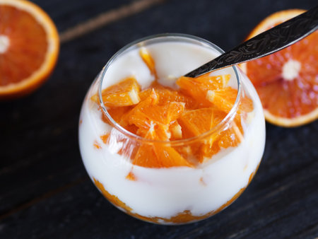 Orange parfait with homemade yogurt, jam and slicesの写真素材