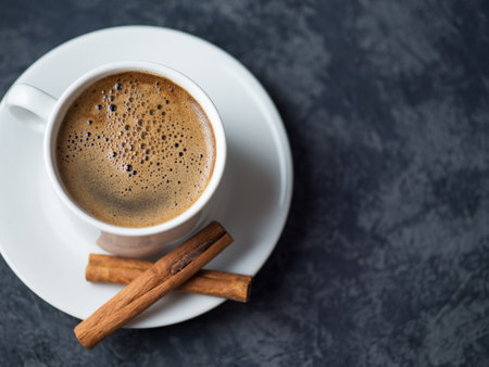 White coffee Cup and chicken slices on stone dark backgroundの写真素材