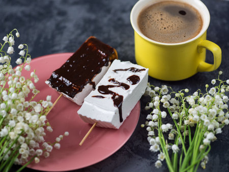 Cup of coffee and homemade marshmallowsの写真素材