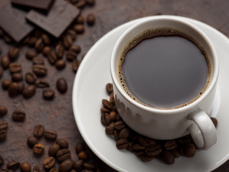 White Cup of coffee and bitter chocolate on concrete backgroundの写真素材