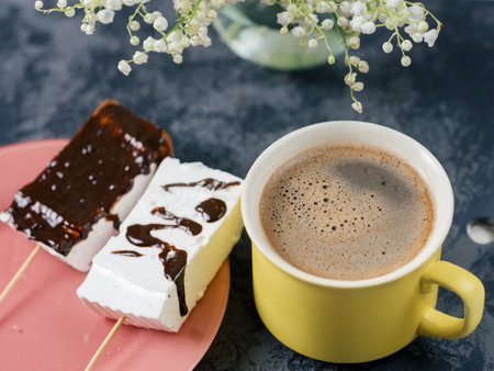 A Cup of coffee and homemade marshmallows. Delicious dessertの写真素材