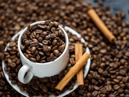 White coffee Cup filled with top quality roasted coffee beansの写真素材