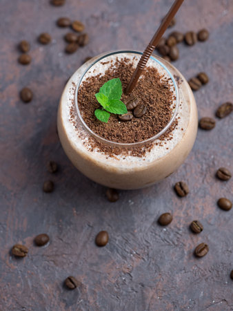 Chocolate smoothie with coffee, cocoa and milk sprinkled with chocolate chipsの写真素材