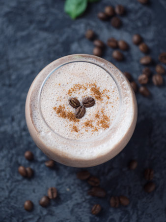 Coffee smoothie with chocolate and milk on a concrete table close-upの写真素材