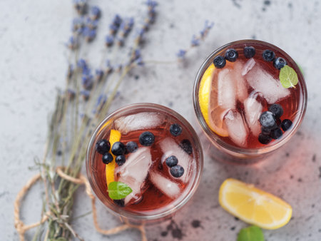 Alcoholic blueberry cocktail with lavender gin and tequila or blueberry Mojitoの写真素材