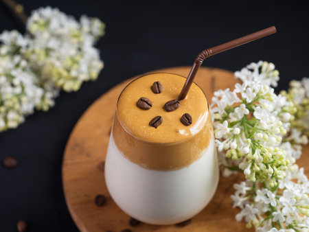 Dalgona coffee trendy drink. Cream coffee with milkの写真素材