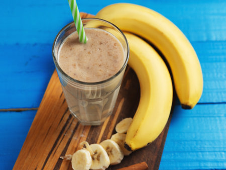 Banana cocktail or smoothie in a glassの写真素材