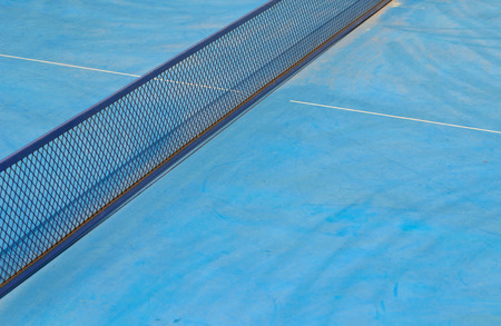 blue table tennis net with shadowの写真素材