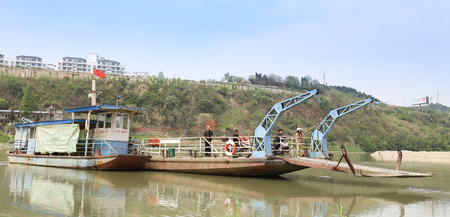 MianYang,CHINA - April 13 2014:ferryboat with passenger on the fujiang river.