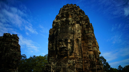 Carved face on temple tower in Angkor wat, Cambodiaの写真素材