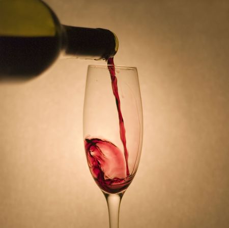 Pouring red wine 